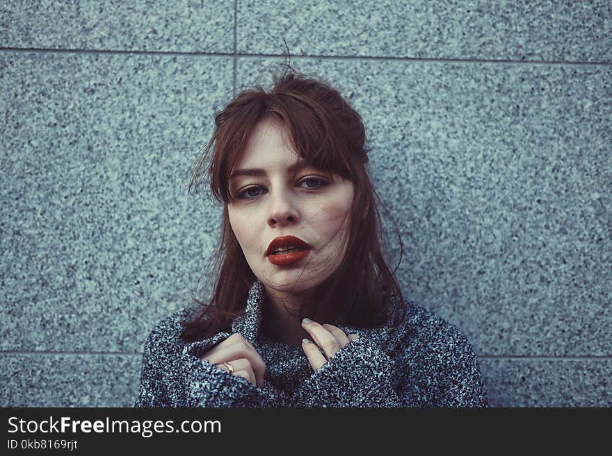 Woman in Gray Sweater