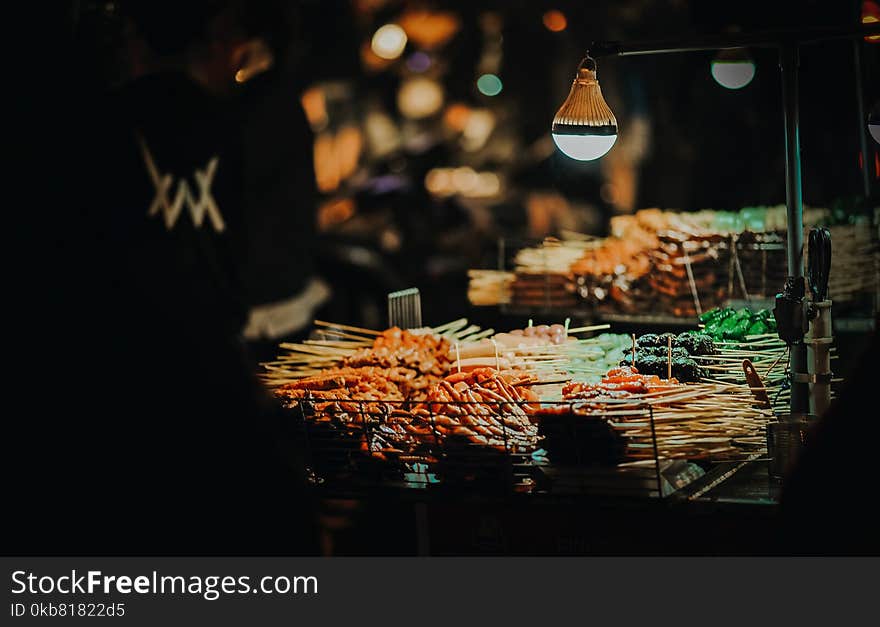 Photo of Street Foods on Cart at Night