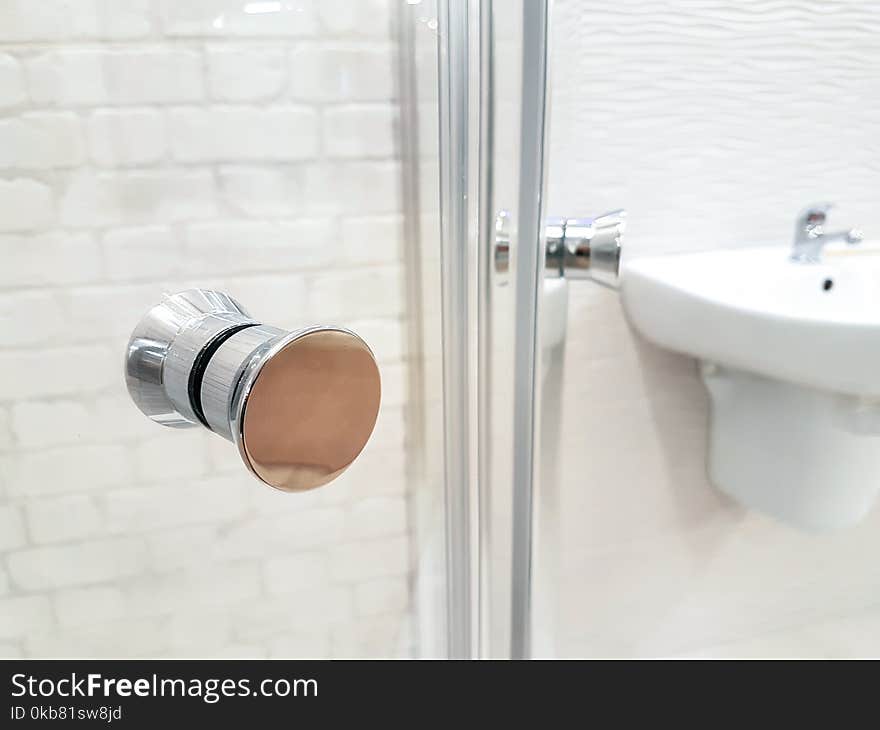 Photo of Opened Door of Bathroom