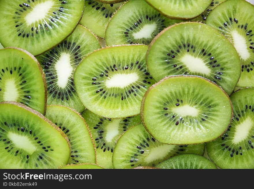 Close-Up Photography of Sliced Kiwi Fruits