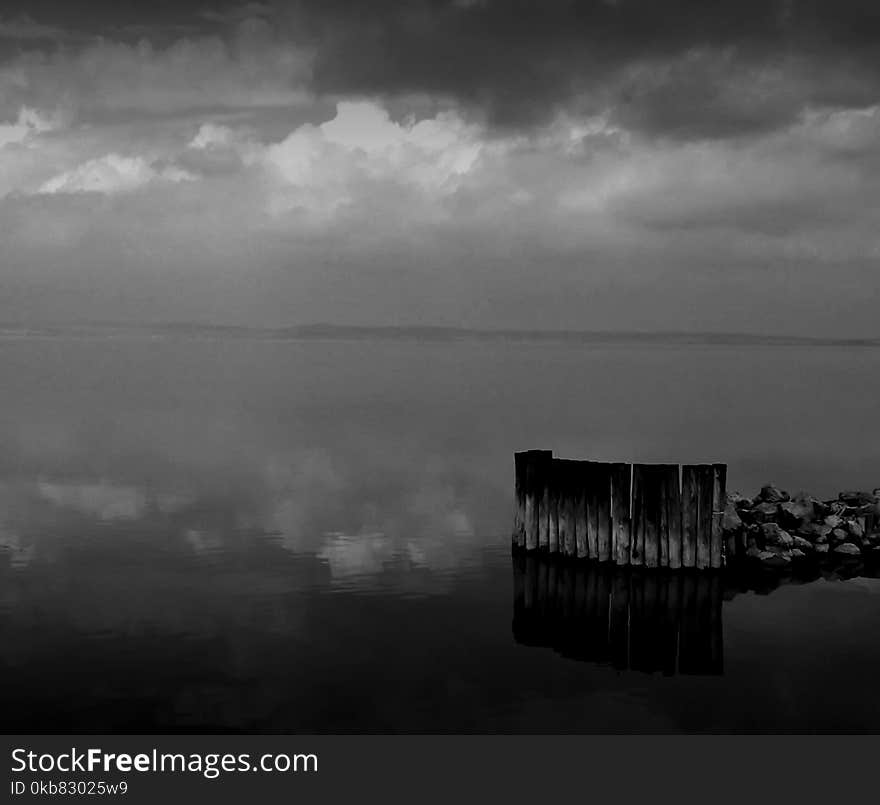 Grayscale Photo Of Body Of Water