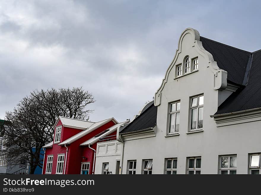 White Concrete Establishment Under Dark Sky Photograph