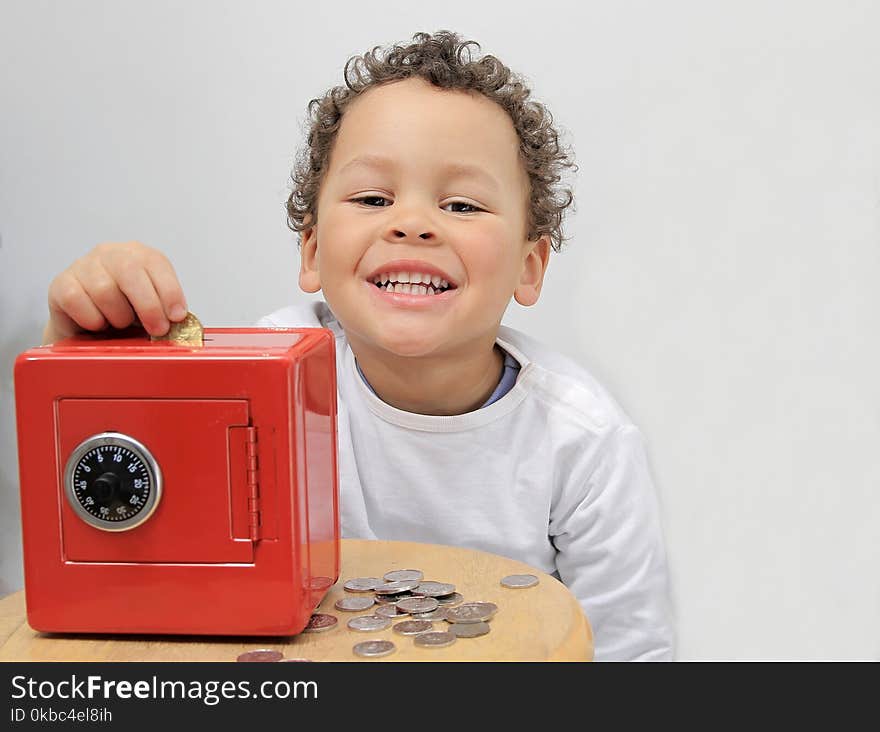 Image of a little boy saving