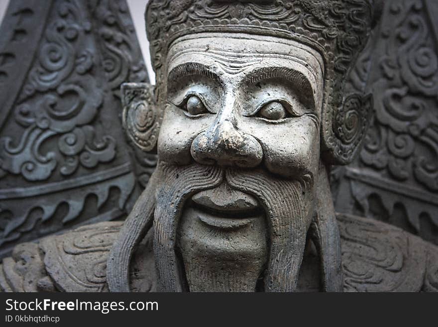 Chinese stone statue at the Wat Pho Temple, Bangkok, Thailand