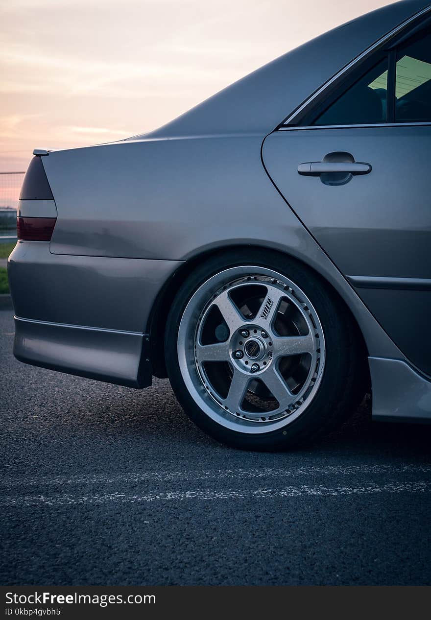 Photography of Car On Asphalt Road