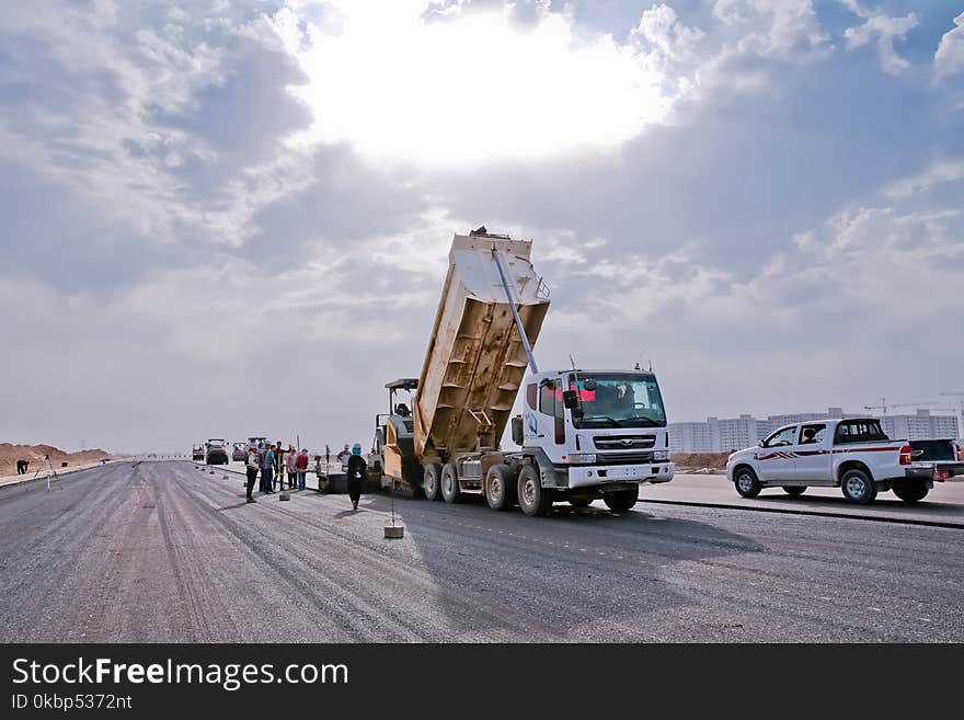 White and Beige Dump Truck