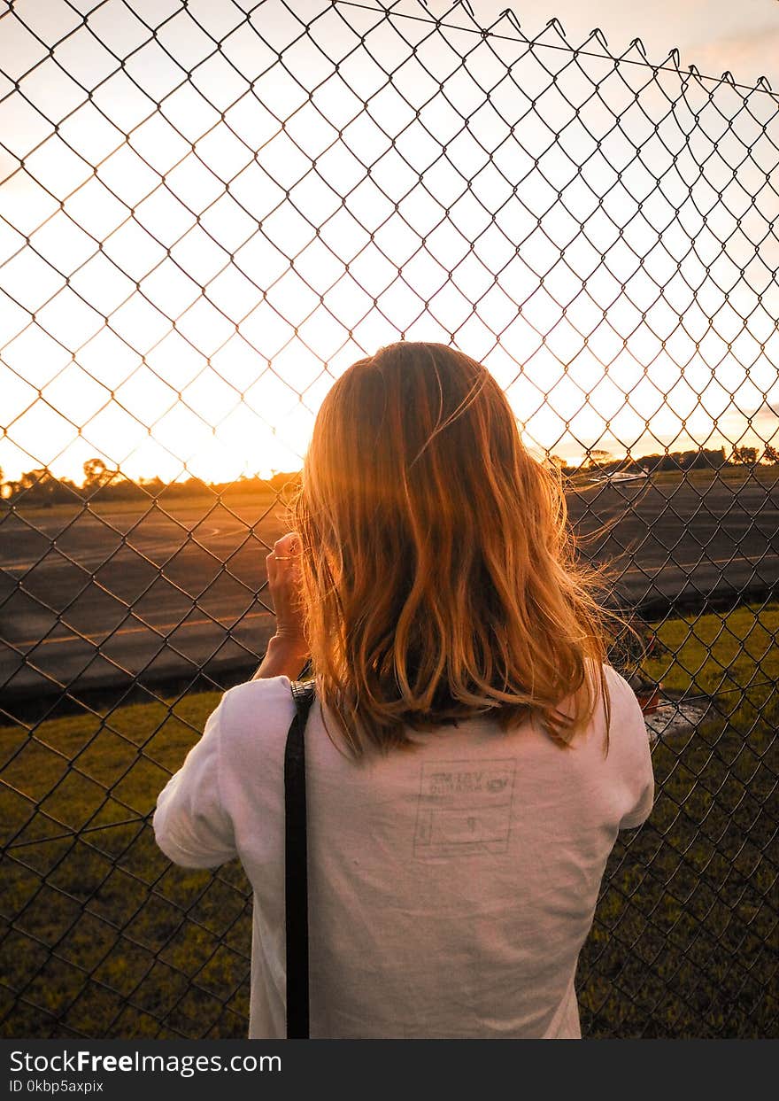 Person Wearing White Crew-neck T-shirt