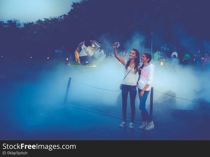 Photo Of Two Women Taking Selfie