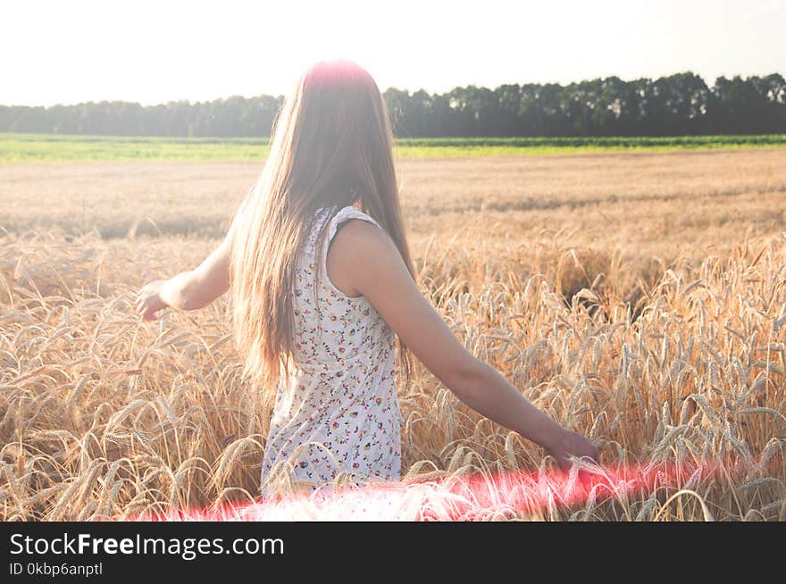 Woman In White Sleeveless Dress