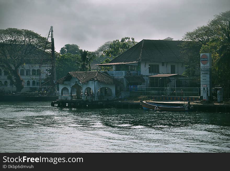 Village Near Body Of Water