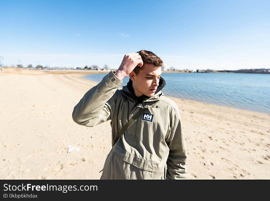 Photography of a Man on Seashore