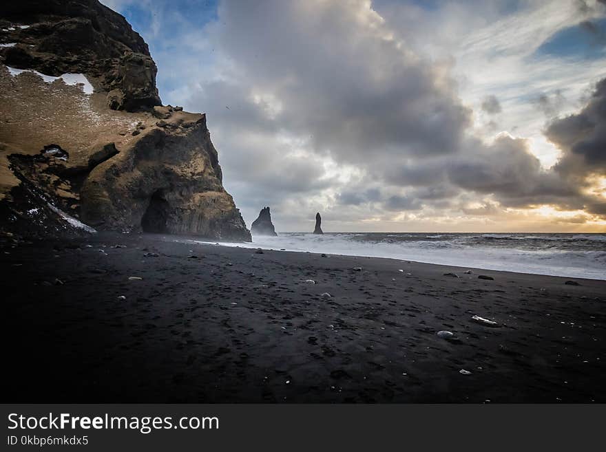 Photo Of Sea Near Cave