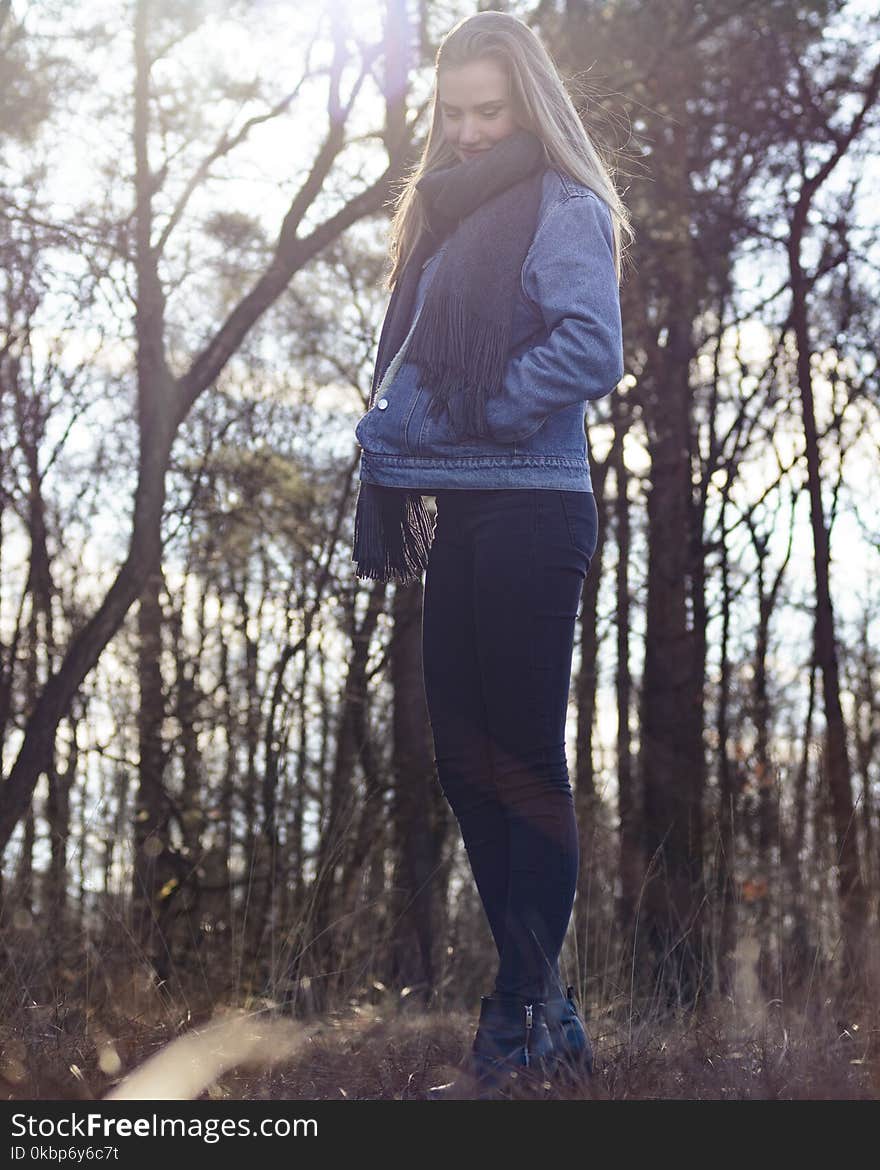 Woman Standing on Grass