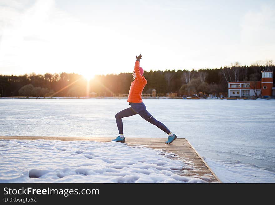 Photo of sports woman on morning exercise in winter