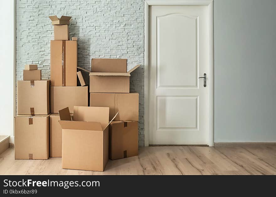 Cardboard boxes on floor indoors