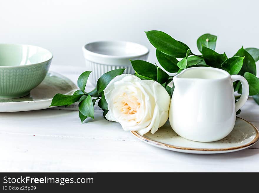 Ceramic Tableware With Flowers On White Background