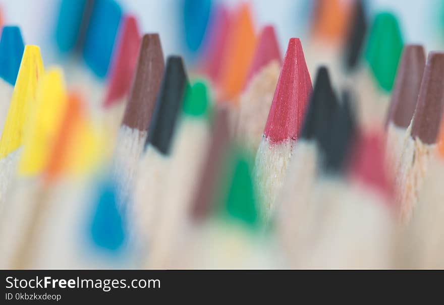 Close up of a pencil colors on a white background.