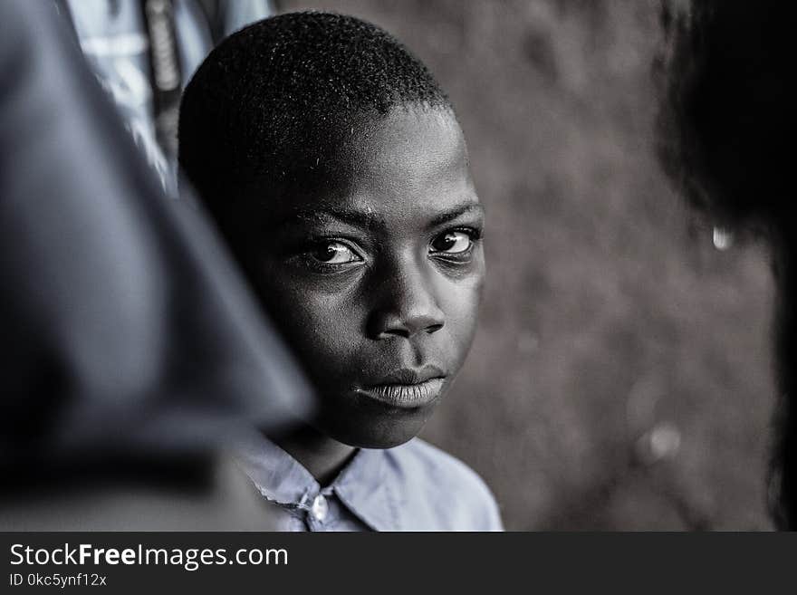 Grayscale Photo of Boy Wearing Collared Shirt