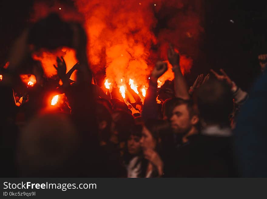 Group of People Gathering Near Bonfire