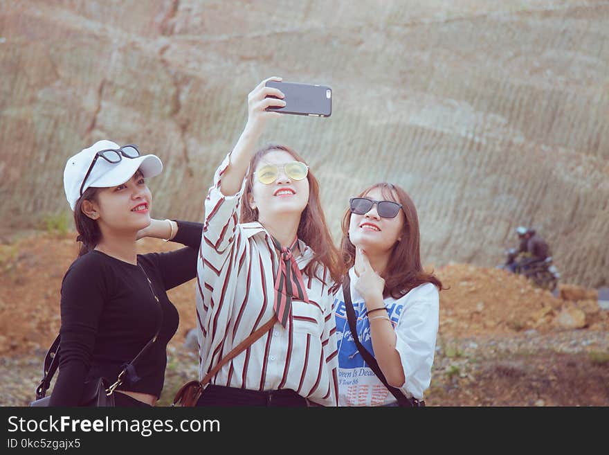 Three Woman Doing Some Selfie