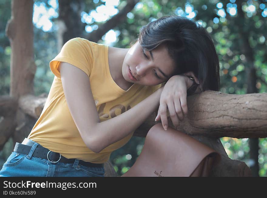 Photo of Woman Wearing Yellow Top