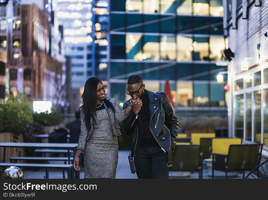 Man Kissing Woman&#x27;s Left Hand