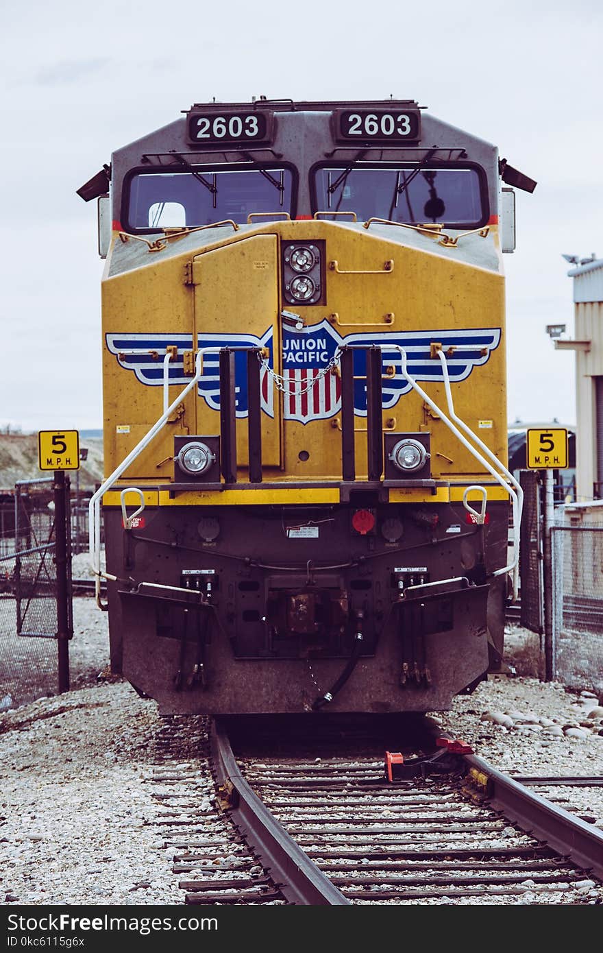 Yellow Train On Railway