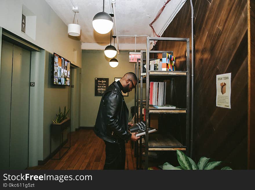 Man Wearing Black Leather Jacket