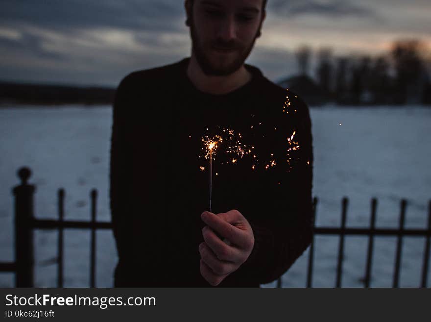 Person Holding Firecracker