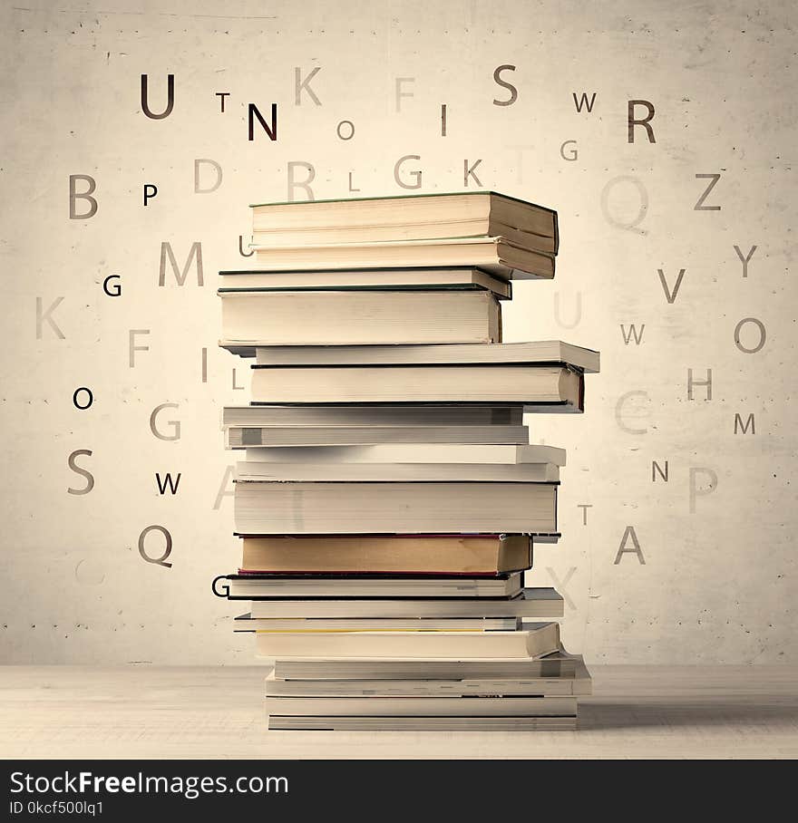 Books with flying letters on vintage background