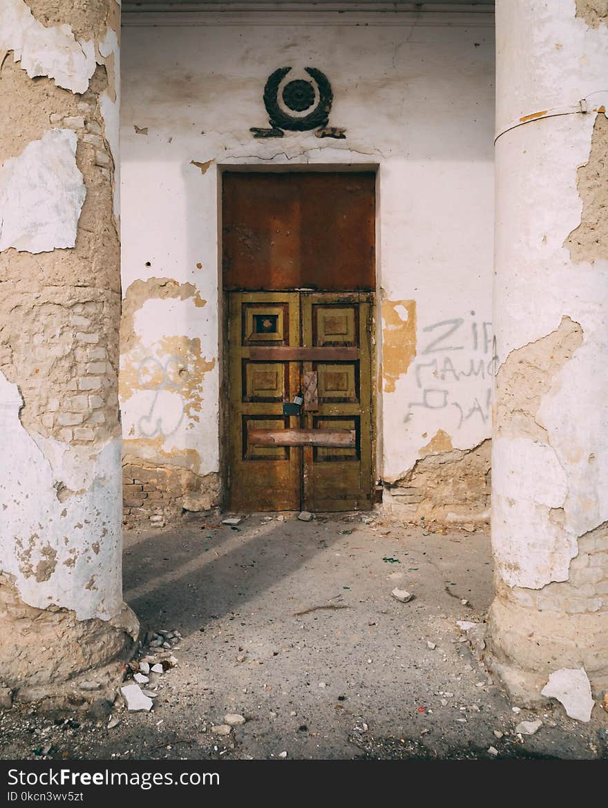 Photo of Brown and Black Wooden Door