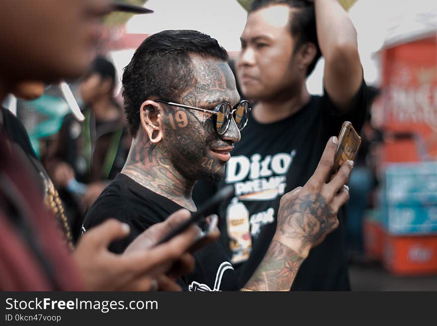 Man With Gray Wash in Full Face Tattoo