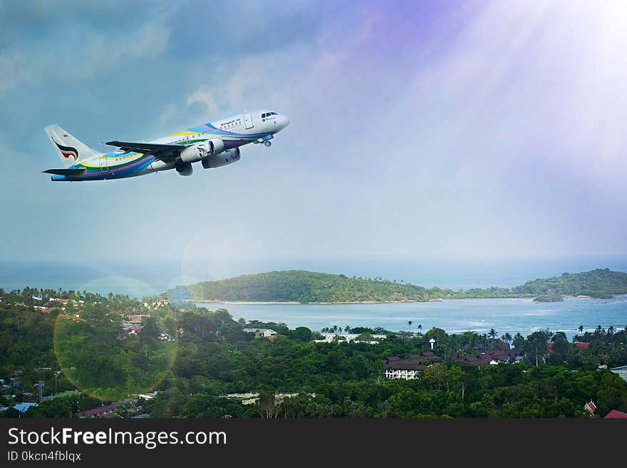 White and Blue Passenger Airplane Aerial Photography