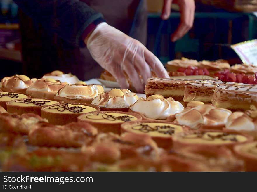 Person Holding a Cupcake