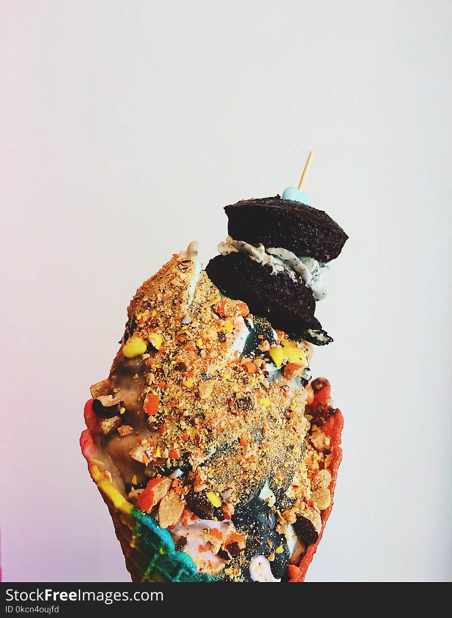 Ice Cream on Cone With Crushed Peanuts and Brownies