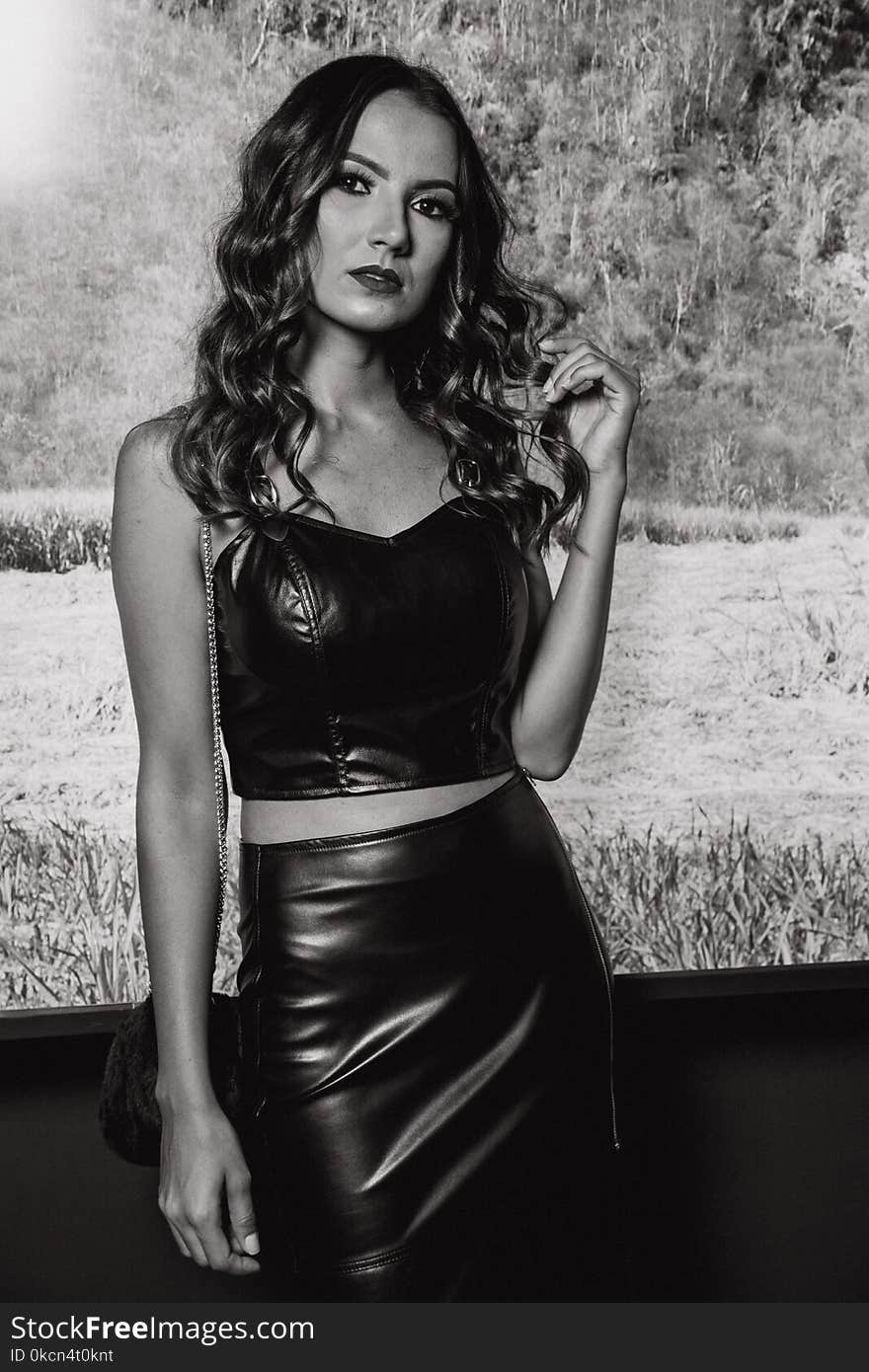 Monochrome Photography of Woman Wearing Black Leather Strapless Crop Top and Black Pencil Skirt