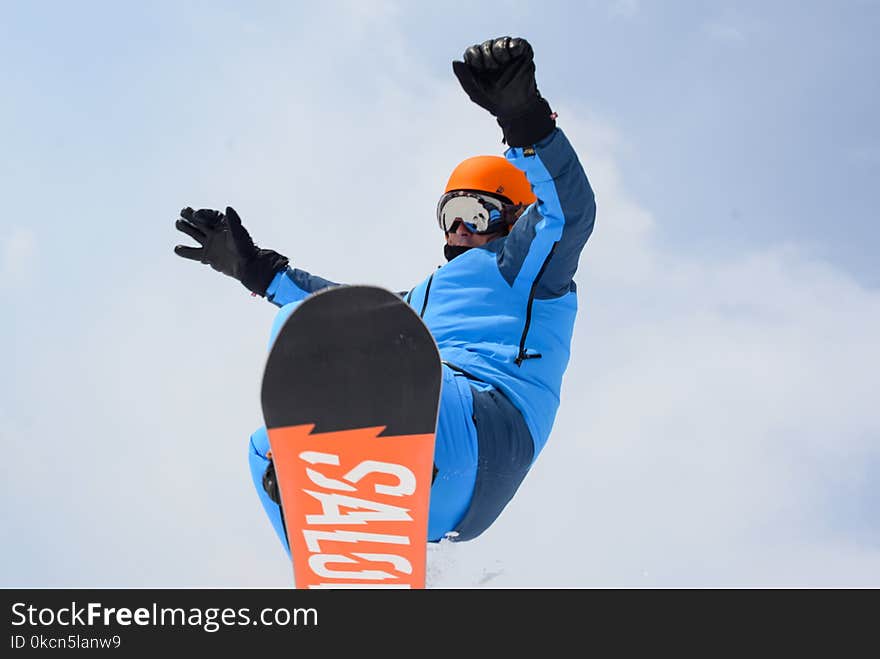 Man on a Snowboard