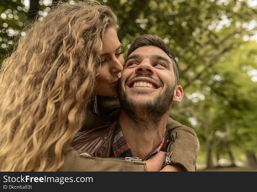 Woman Kissing A Man