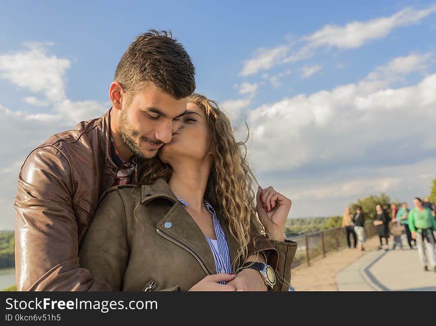 Woman Kissing Man