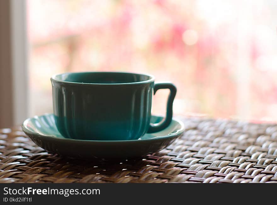 Teal Ceramic Cup and Saucer