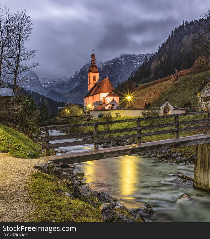 Brown and Beige House With Background of Mountain