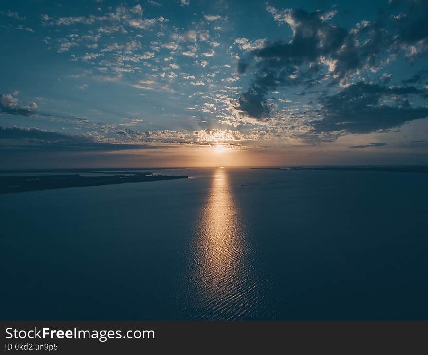 Bird&#x27;s Eye View of Ocean During Sunset