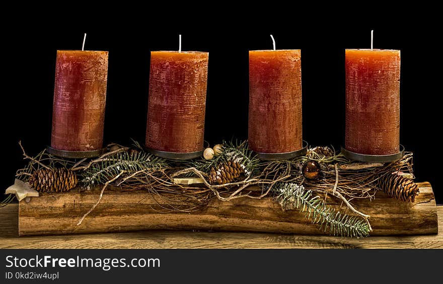 Four Brown Wax Candles