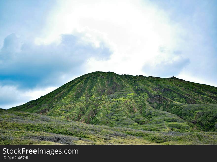 Green Mountain Under White Cloudy Sky