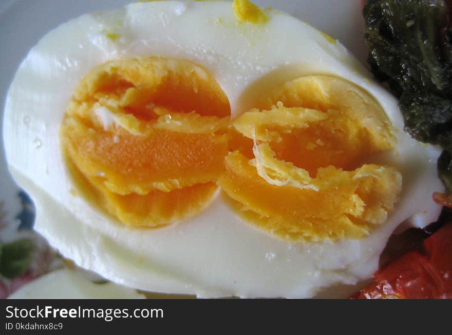 Rare case of twin yolks in a hen`s egg. Half hard boiled egg. Rare case of twin yolks in a hen`s egg. Half hard boiled egg.