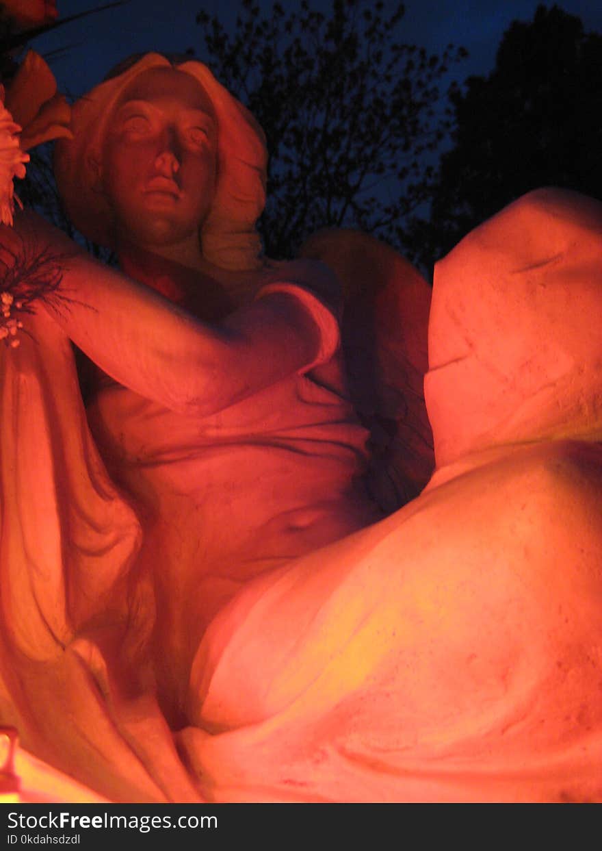 Funerary sculpture at night during the Day of the Dead in Cluj-Napoca, Transylvania, Romania. Funerary sculpture at night during the Day of the Dead in Cluj-Napoca, Transylvania, Romania.