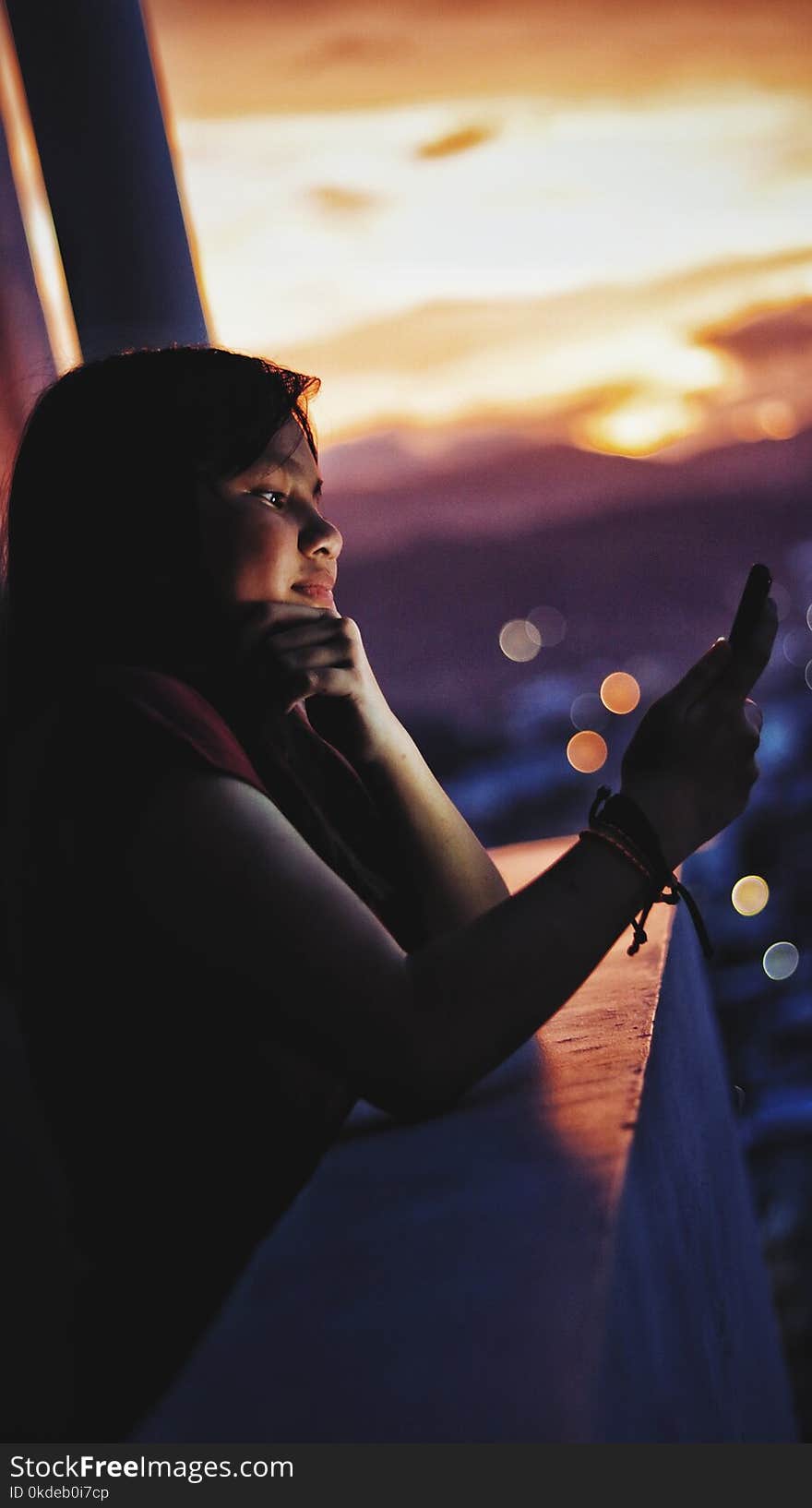 Woman in Red Shirt Facing on Her Phone