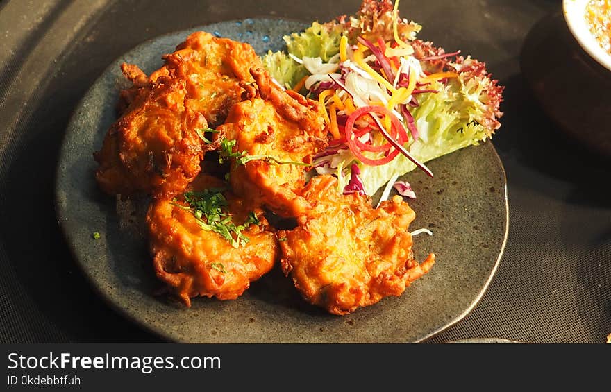 Food Dish Served on Black Ceramic Plate