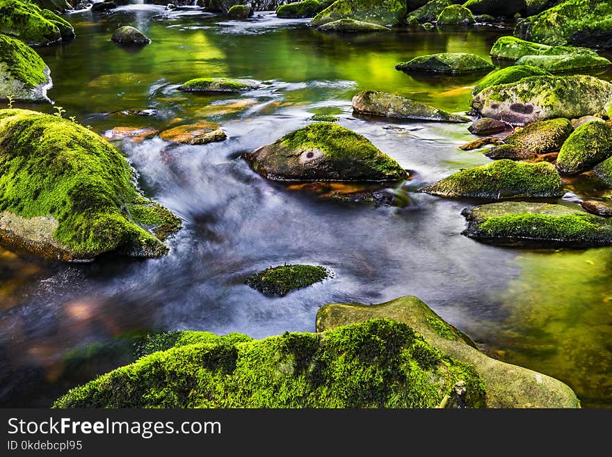 Body of Water With Rocks