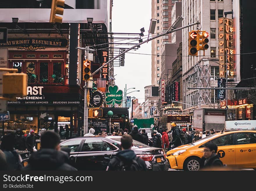 Group of People Walking on Street